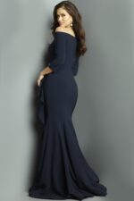 Backside image of model in Jovani 09623, navy off-shoulder gown.