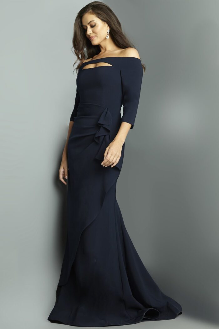 Side view of model in Jovani 09623 navy gown, showing off-shoulder cutout.