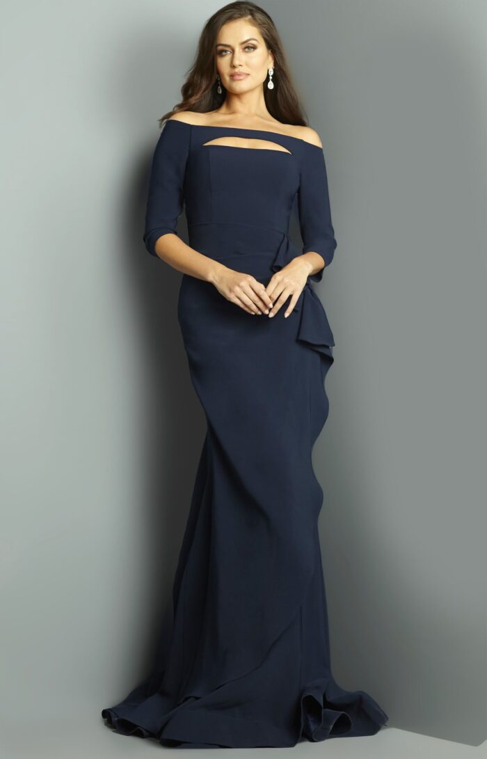 Model showcasing Jovani 09623 navy gown, featuring an off-shoulder neckline with cutout.