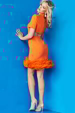model wearing Jovani 08253 in orange showing back cutout