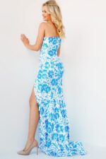 model wearing Jovani 08256 ivory blue floral gown back view