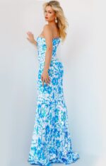 model wearing Jovani 08256 ivory blue floral gown back view