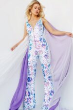 model wearing Jovani 08258, front view with sheer drapes, white multi-colored floral dress
