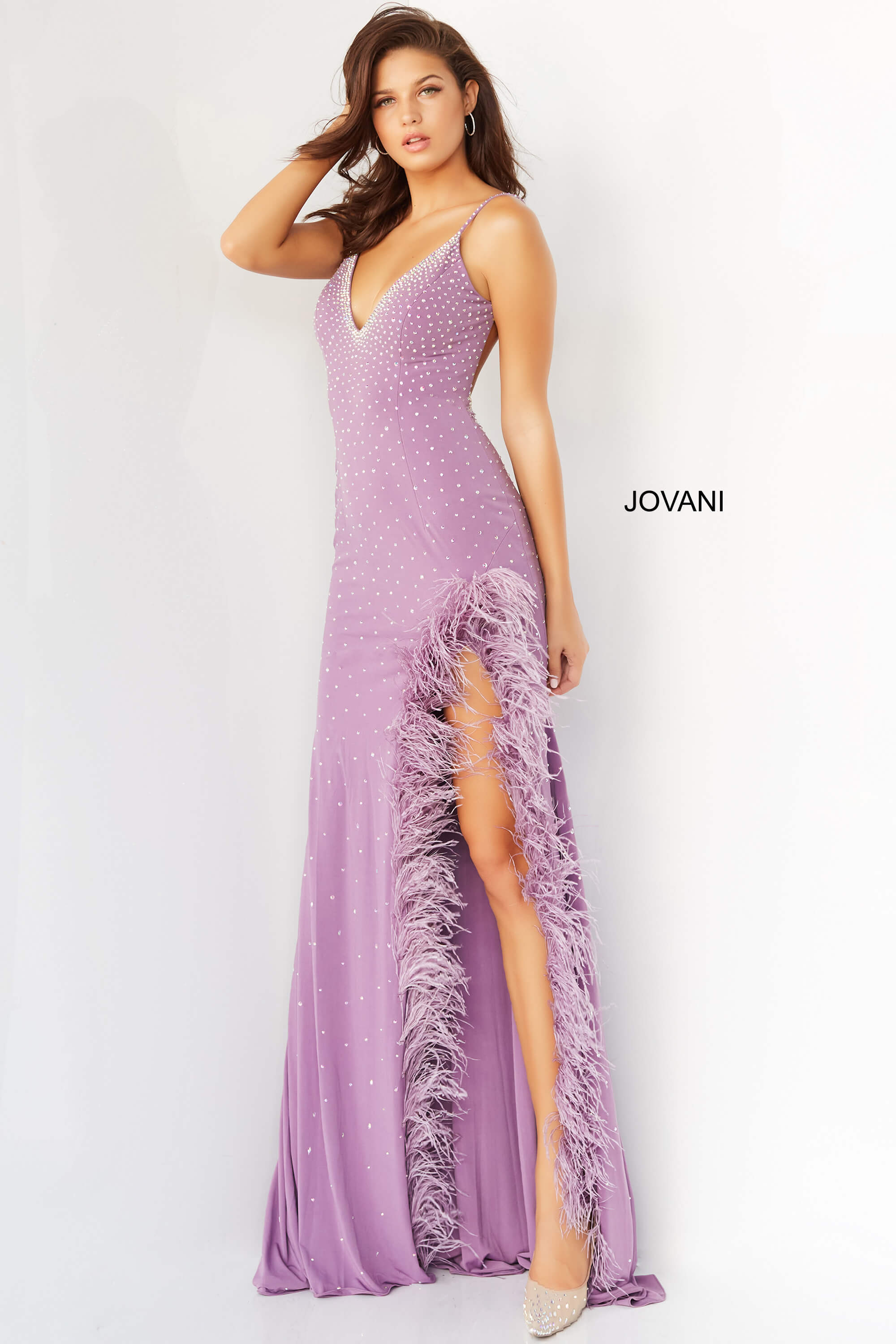 08283-LILAC-2023-2.jpg Model wearing Jovani 08283 lilac floor-length dress with V-neckline and feather details.