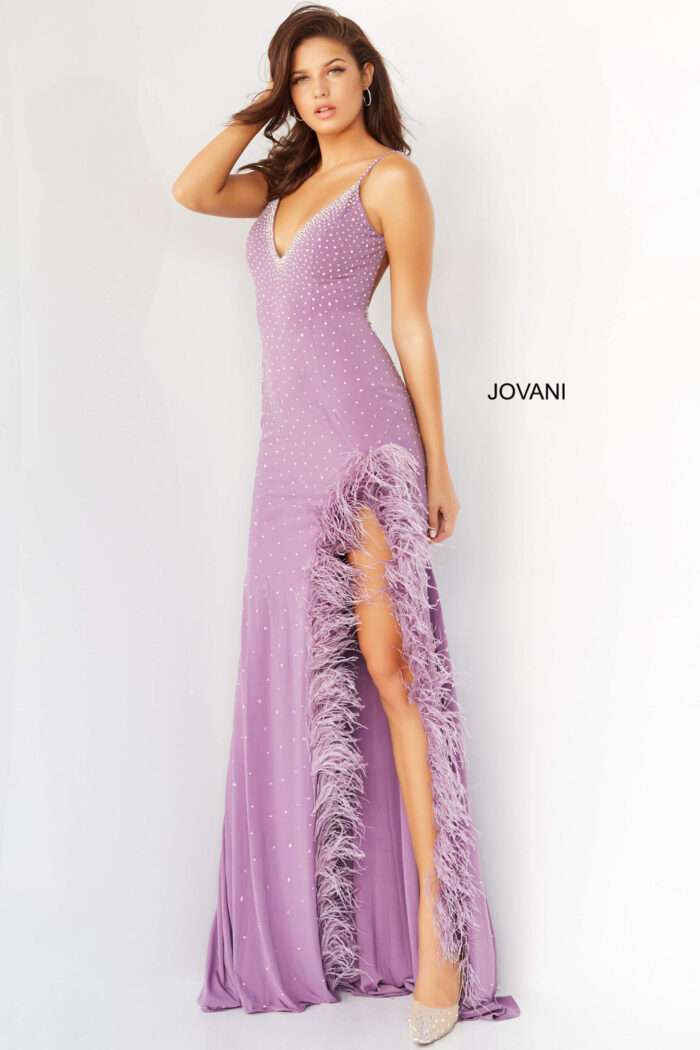 model wearing Jovani 08283 lilac gown with high slit and feather accents