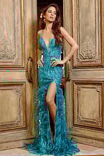 Side view of model in Jovani 08340 turquoise gown, showing V-neckline and high slit.