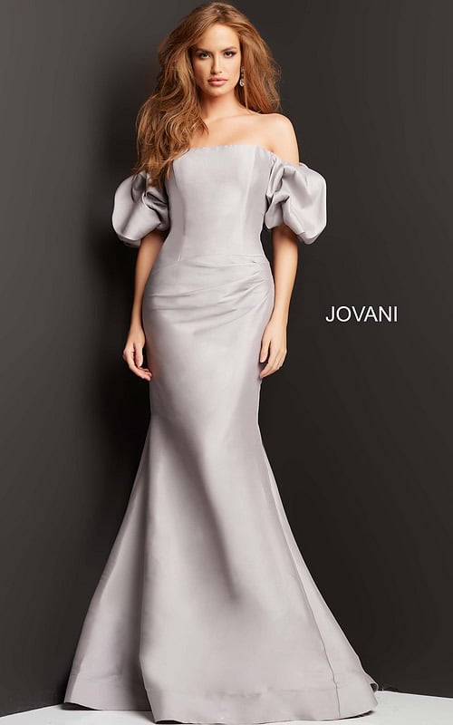 Model wearing Jovani 08361 gown with off-shoulder neckline and puff sleeves, front view.