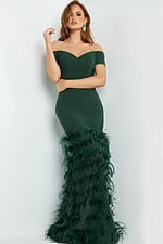 Model wearing Jovani 08384 green off-the-shoulder mermaid dress, front view with hands on waist