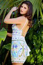 Model wearing Jovani 08447 white multi cocktail dress with colorful beadwork.