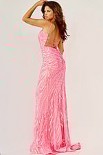 Model wearing Jovani 08481 in neon pink, front view showing exquisite design.