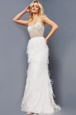 Model wearing Jovani 08525 front view of white gown with feathered skirt and sheer bodice.