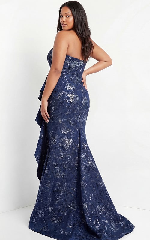 Navy metallic gown from the back with strapless fitted silhouette.