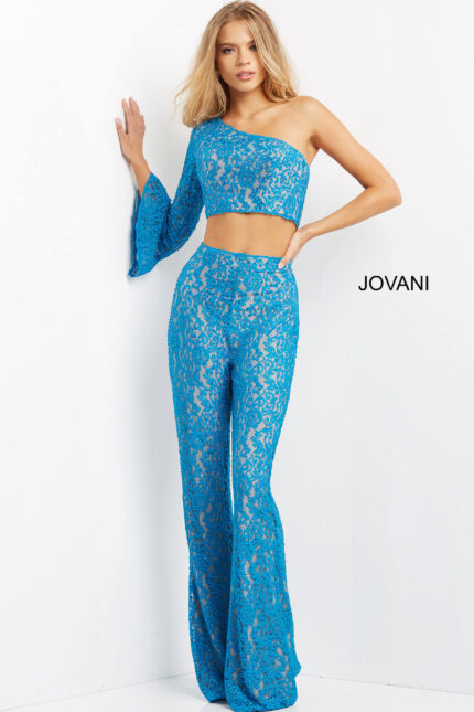 Model wearing Jovani 08693 blue lace ensemble with asymmetrical neckline.
