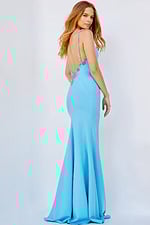 model wearing Jovani 09009 blue gown shown from back view