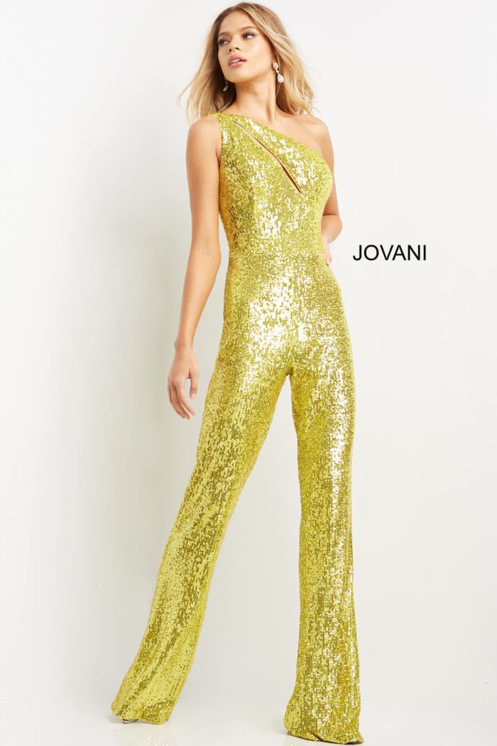 Model wearing Jovani 09017 yellow sequined one-shoulder jumpsuit with cutout.