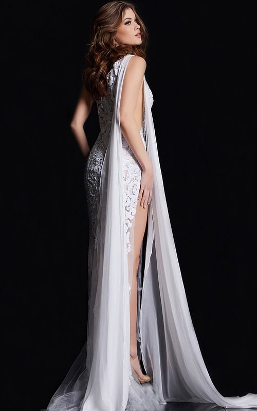 Model showcasing the back view of Jovani 09882 white gown with elegant drape and high slit.