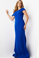 Model wearing Jovani 09129 navy mermaid dress featuring off-the-shoulder sleeve.