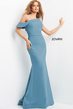 Model showcasing Jovani 09129 seafoam mermaid dress with one-shoulder design.