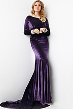 Model wearing full-length Jovani 09139 velvet purple gown with a high neckline.
