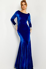 Model wearing Jovani 09139 in royal, front view with bateau neckline and embellished cuffs.
