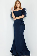 Model in Jovani 09154 navy gown, front view, feathered sleeve detail.