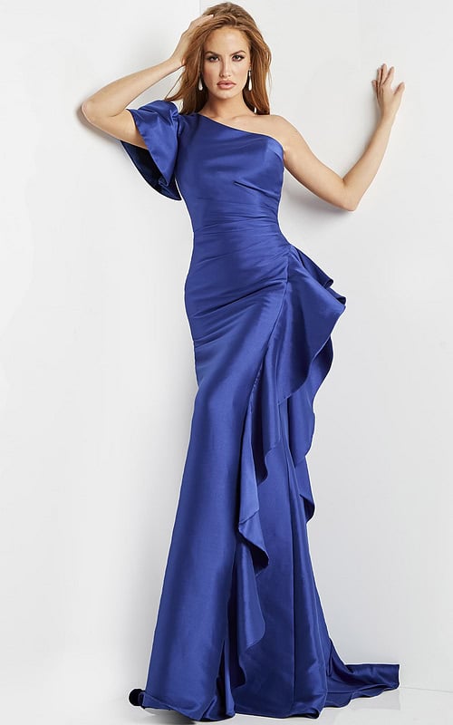 Model wearing Jovani 09201 elegant floor-length blue gown with a one-shoulder puff sleeve and ruffle detailing.
