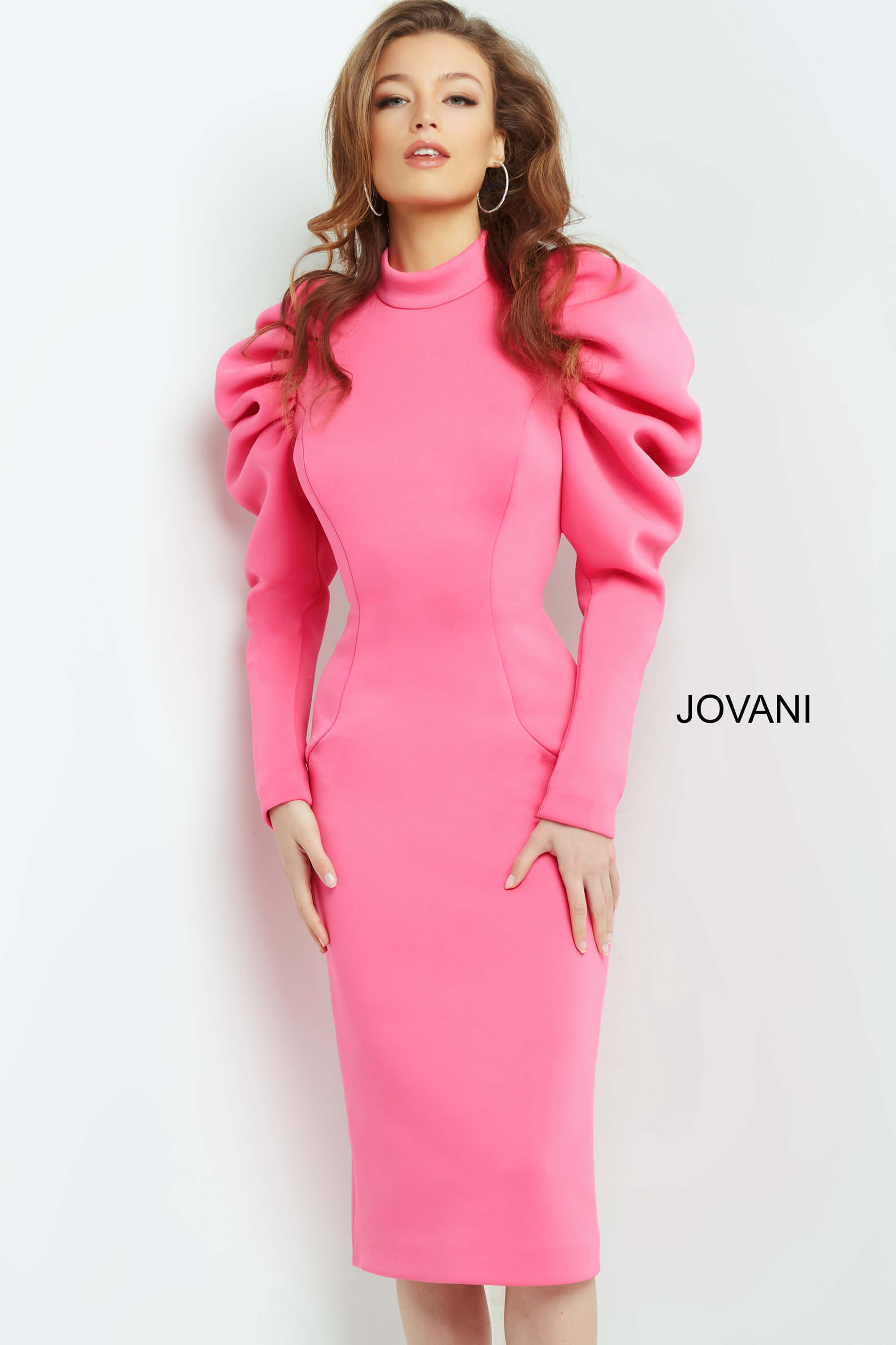 09335-Hot-pink-1.jpg Model wearing Jovani 09355 pink dress with puff shoulders and high neckline, front view.