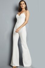 Model in Jovani 09381 ivory jumpsuit, angled front view without jacket.