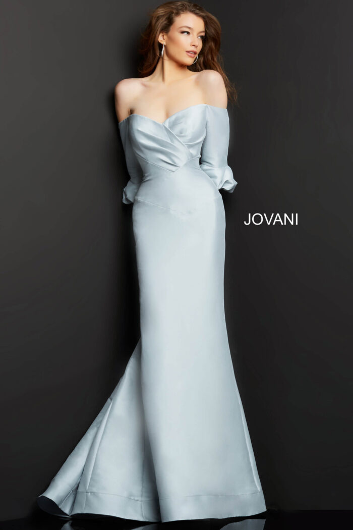 Model wearing Jovani 09420 silver dress, front view showcasing off-shoulder style