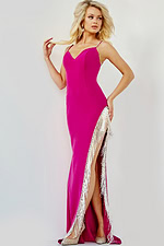 Model wearing Jovani 09462 fuchsia gown with V-neckline and fringe detail in the front view.