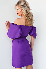 model wearing Jovani 09476 purple dress with off-shoulder neckline and puff sleeves back view