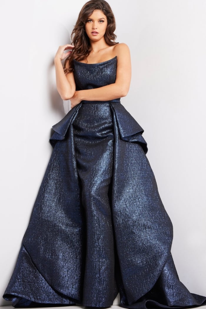 Model in Jovani 09481 facing forward, highlighting the royal gown’s detailed design.
