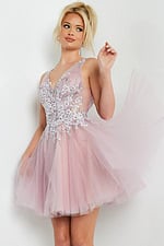 model wearing Jovani 09518 blush mini dress with floral applique and V-neckline