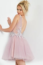 model showcasing the back of Jovani 09518 blush dress with floral details