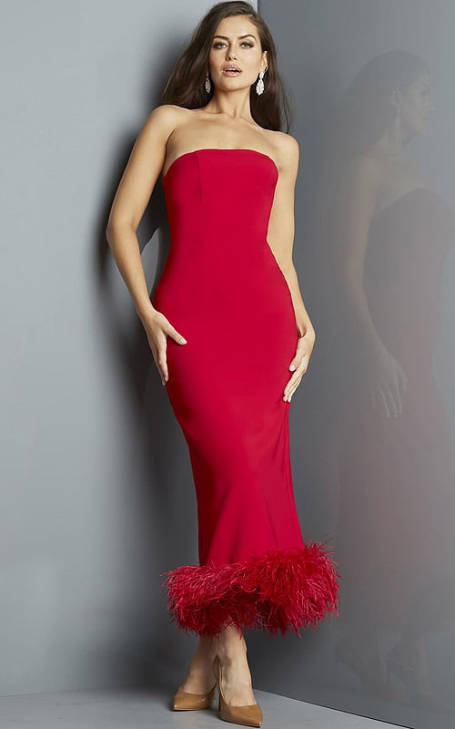 Model wearing Jovani 09630 red dress with feathered hem, front view.