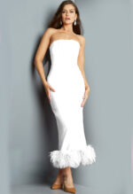 Model wearing Jovani 09630 white evening dress with feather trim, front view.