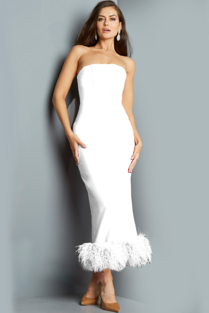 Model wearing Jovani 09630 white evening dress with feather trim, front view.