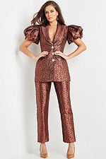 Model wearing Jovani 09643 brown pantsuit with deep V-neckline and blouson sleeves.