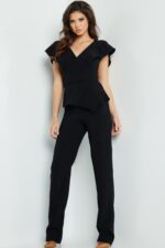 Model wearing Jovani 09646 in black, front view, full length V-neck jumpsuit.