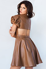 Back view of model in Jovani 09690 brown dress highlighting the open back design and puff sleeves.
