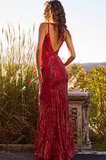Back view of model wearing Jovani 09693 red gown with low back.