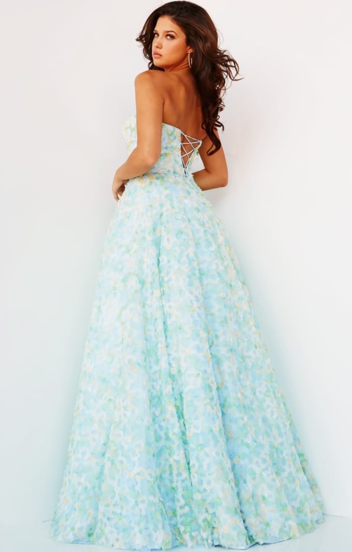 Model wearing K09765, back view showing lace-up detail of multi-colored A-line gown.