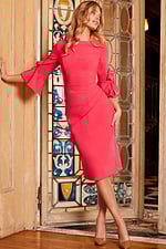 Model wearing Jovani 09775 red dress, front angled view.