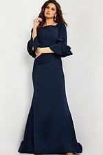 Model wearing Jovani 09776 navy dress, front view.