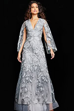 Silver Jovani 09809 gown with A-line silhouette and elegant cape sleeves.
