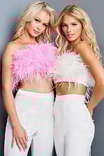 Close-up of two models in Jovani 09835 showing feather detail.
