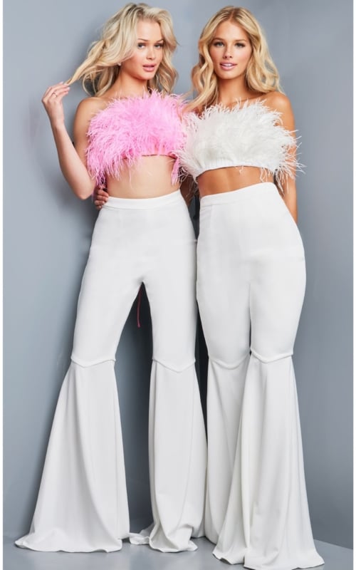 Two models wearing Jovani 09835 ivory feather tops and wide-leg pants.