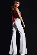 Jovani 09836 side view of hot pink ensemble with flared trousers