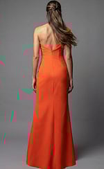 Back view of fitted gown with deep V back and floor length skirt