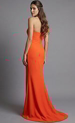 Side view of fitted one shoulder gown with smooth back and flowing hem